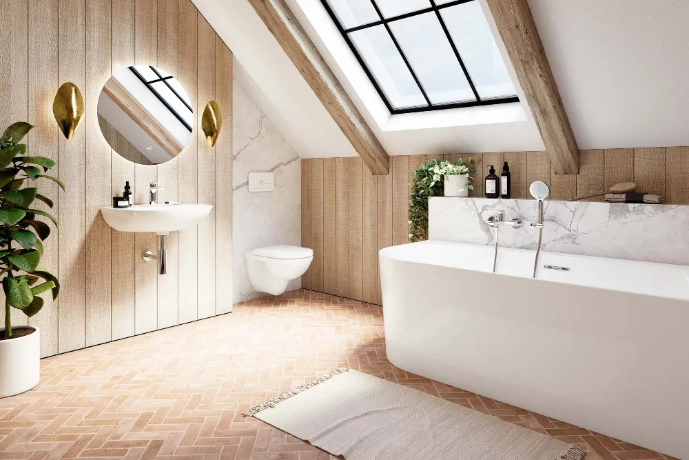 Ein modernes Bad mit Badewanne, Wandwaschbecken, rundem Spiegel und WC aus der Kollektion O.novo. Ein großes Oberlicht und eine Topfpflanze werten den Raum auf. Holzakzente und Fischgrätenfliesen geben dem Raum einen rustikalen Touch.